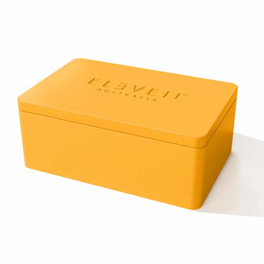 Packaged in a bold, reusable yellow tin, this limited-edition trio combines shine, nourishment, and sustainability in one vibrant bundle